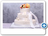 wedding cake with flowers on top