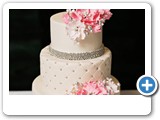 white and silver wedding cake pink flowers
